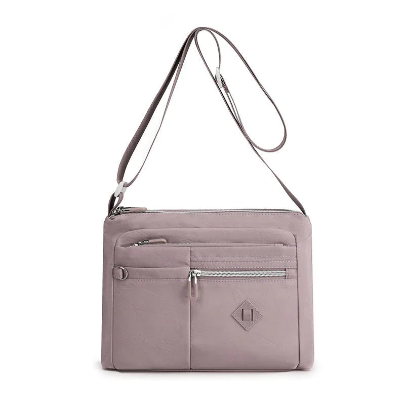 Lightweight multi-pocket shoulder bag for both men and women