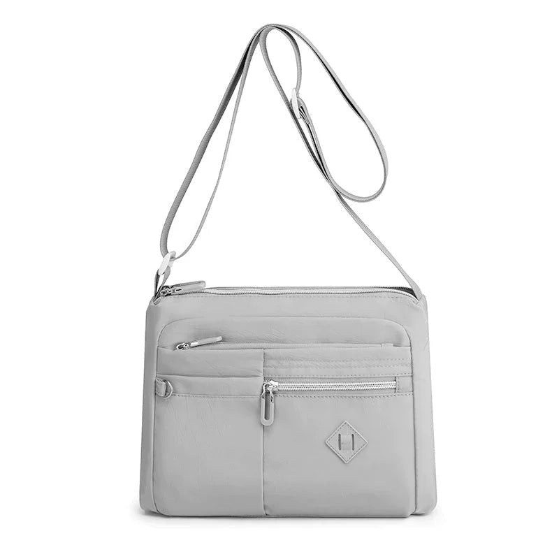 Lightweight multi-pocket shoulder bag for both men and women