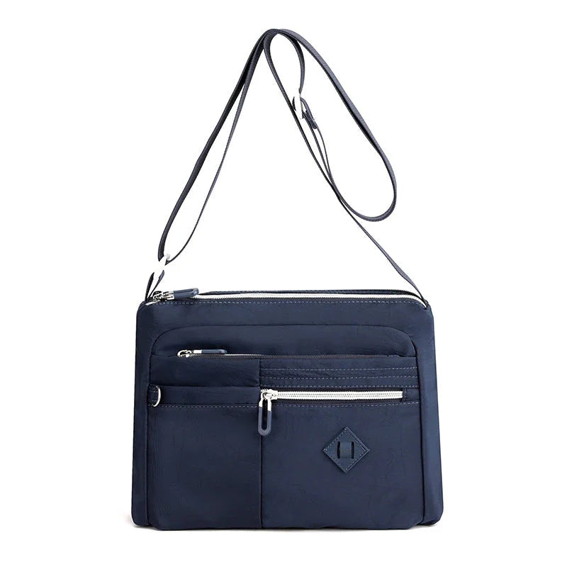 Lightweight multi-pocket shoulder bag for both men and women