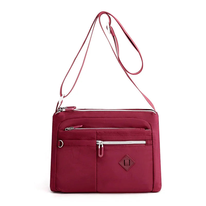 Lightweight multi-pocket shoulder bag for both men and women